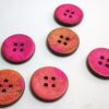 boton de madera rosa